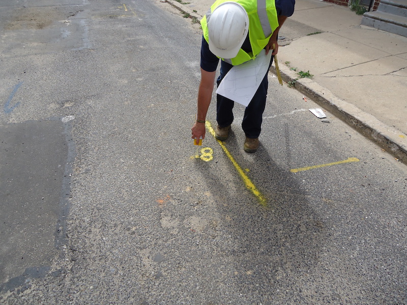 PGW employee marking the street for roadwork